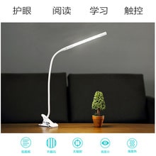 USB Gooseneck Clip Lamp - Black version showing elegant design on wooden desk